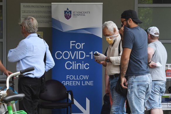 People queue at a coronavirus testing clinic St Vincent's Hospital in March.
