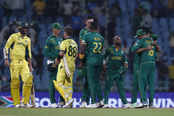 South Africa team members celebrate their team’s win over Australia.