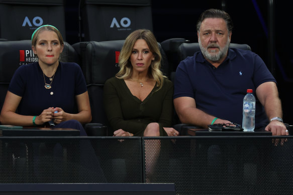 Courtside seats: Actor Russell Crowe, alongside girlfriend Britney Theriot, watches the women’s singles final at the Australian Open between Ashleigh Barty and American Danielle Collins.