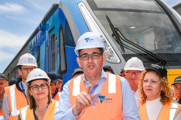 Mr Andrews and Ms Allan (left) at the announcement of the train project in 2016.