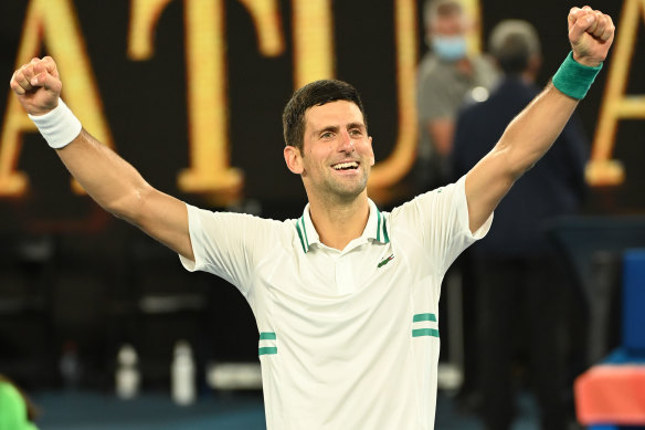 Novak Djokovic celebrates his ninth Australian Open title. 