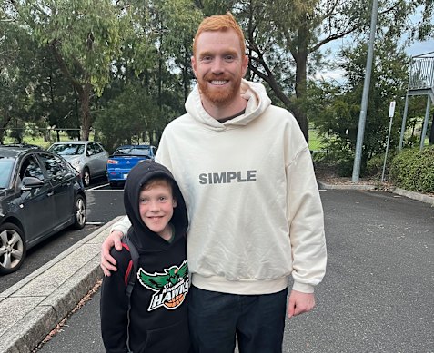Mason with South East Melbourne Phoenix guard and ex-Ringwood Hawks star Angus Glover.
