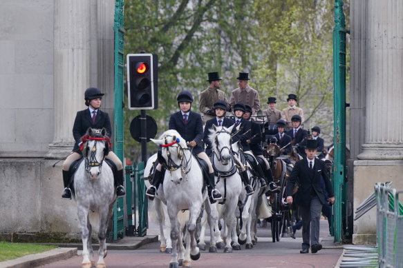 Six of the eight Windsor gray horses will pull the Golden State carriage in Hyde Park, central London, during rehearsals for the coronation.