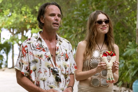 Chelsea (Aimee Lou Wood) and Rick (Walton Goggins), the grumpiest man to ever put on a tropical shirt.