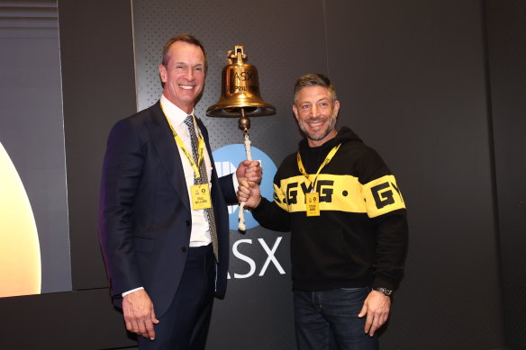 Guzman y Gomez co-chief executive Steven Marks (right) and Automic managing director Paul Williams ring the bell to mark the company’s listing.