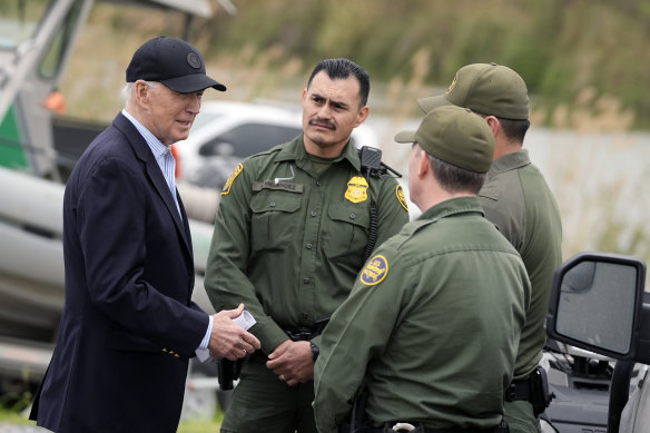 President Joe Biden talks with US Border Patrol in Brownsville, Texas, along the Rio Grande river.