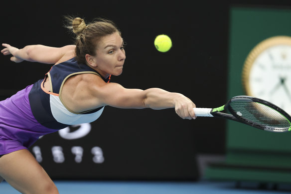 Romania’s Simona Halep hits a backhand return to United States’ Serena Williams in 2021.