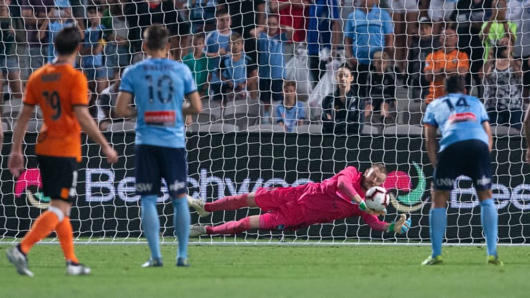 Three points: Andrew Redmayne saves a late penalty to seal Sydney FC's victory over the Roar.