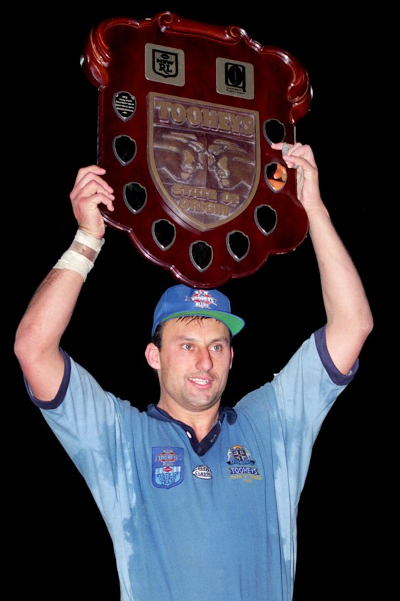 Laurie Daley holds up the Origin shield in 1994.