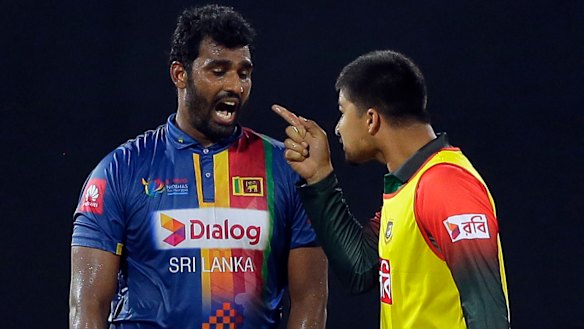 Blow-up: Sri Lanka's Thisara Perera and Bangladesh substitute Nurul Hasan in a heated spat.