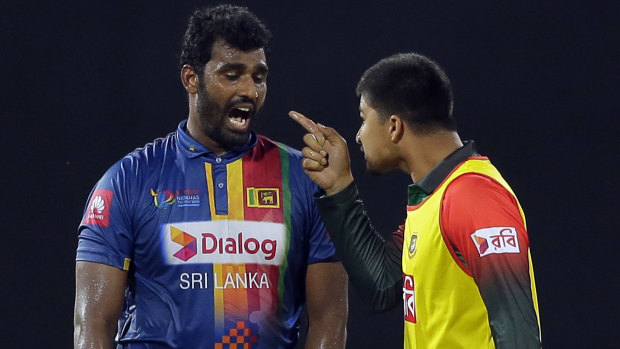Blow-up: Sri Lanka's Thisara Perera and Bangladesh substitute Nurul Hasan in a heated spat.