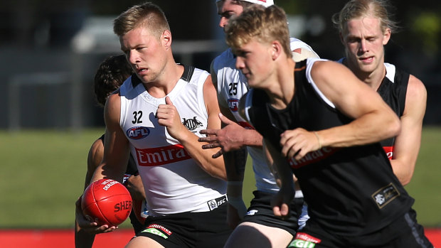 Jordan De Goey (left) at Collingwood VFL training on Monday.