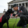 Veteran James Farquharson with his service dog, Peggy. 