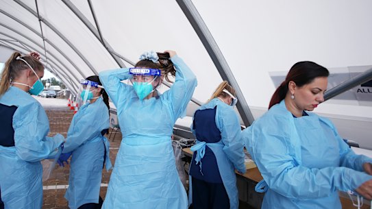 Nurses prepare to conduct COVID-19 tests at Bondi Beach testing clinic in Sydney. 