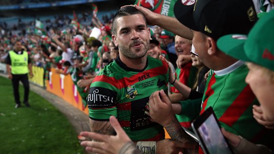 Heart and soul: Adam Reynolds celebrates with Rabbitohs fans after starring in the 2014 grand final victory.