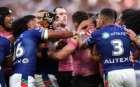 Josh Curran and Nathan Cleary rumble after the Penrith halfback’s big hit.