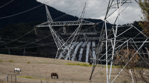 Transmission towers near Snowy Hydro’s Tumut 3 power station. More of these will be needed when the Snowy 2.0 project but who will pay?
