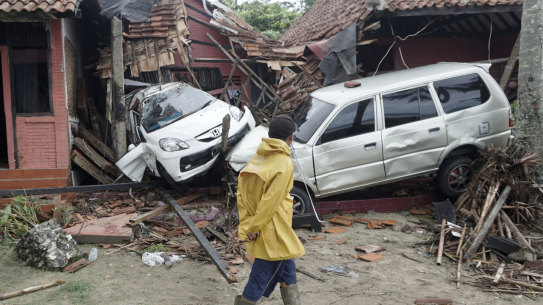 Homes and vehicles were severely damaged in the disaster. 