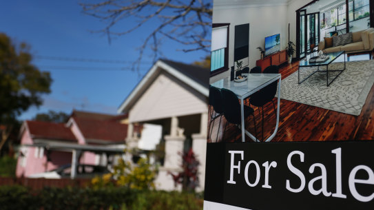 Australians are spending a record share of their incomes servicing mortgages as interest rates, and the size of home loans, surge.