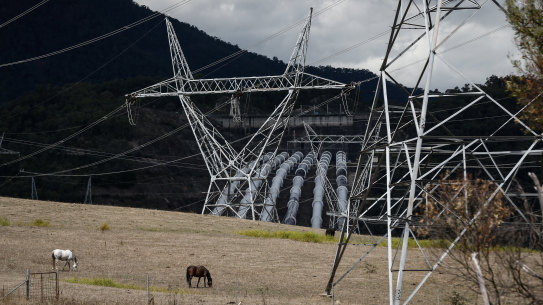 Transmission towers near Snowy Hydro’s Tumut 3 power station. More of these will be needed when the Snowy 2.0 project but who will pay?