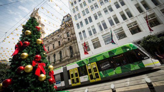 Christmas decorations in Melbourne’s Bourke Street Mall. Premier Daniel Andrews has promised NSW and Victoria will do all they can to keep their borders open to each other ahead of the festive season.