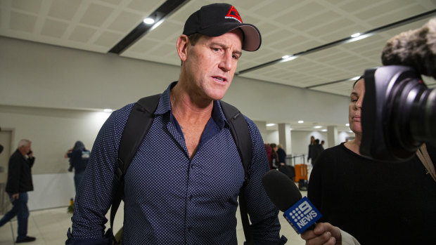 No apologies as Roberts-Smith returns to Australia following defamation judgment