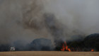 The Morris family and CFS firefighters battle bushfires at the edge of their farm on January 11, 2020 in Karatta, Australia.  