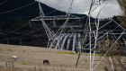 Transmission towers near Snowy Hydro’s Tumut 3 power station. More of these will be needed when the Snowy 2.0 project is built but who will pay?