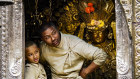 Child and adult priests at Kwa Bahal, or Golden Temple, Patan.