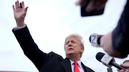 Republican presidential candidate former President Donald Trump addresses members of the press during a campaign stop in Londonderry, New Hampshire.