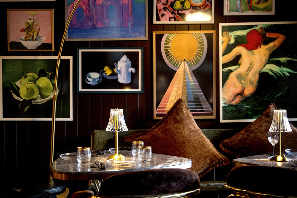 Bar Conexao’s moody, art-filled space was previously a photography studio.