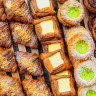 Mandarin and macadamia croissants, custard tarts, pandan coconut brioche and Vegemite avocado and chilli scrolls, at Shadow Baking. 