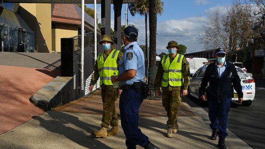Police and the Australian Defence Force patrol the streets of Bankstown, one of the LGAs with strict restrictions allowing only healthcare and emergency service essential workers to leave the area during the lockdown. 