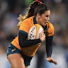 Charlotte Caslick of the Wallaroos runs the ball during the Pacific Four Series International Match between Australia Wallaroos and USA.