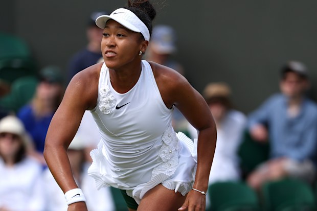 Naomi Osaka serves against Anastasia Gasanova on day three of The Championships Wimbledon 2026 at All England Lawn Tennis and Croquet Club on July 01, 2026 in London, England.