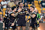 Xavier Willison of the Broncos celebrates after scoring a try.