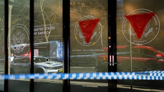 Windows were smashed and red inverted triangles painted on the US consulate building. 