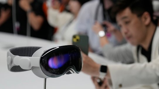 The Apple Vision Pro headset is displayed in a showroom on the Apple campus in Cupertino, California.