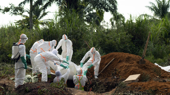 An Ebola victim is put to rest at the Muslim cemetery in Beni, Congo, last year.