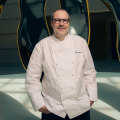 Chef Martin Benn with Japanese artist Yayoi Kusama’s work Dancing Pumpkin at NGV International.