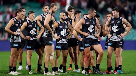 Carlton players after their loss to Sydney.
