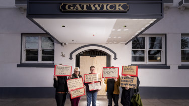 Homelessness support workers including SJ Finn and Billi Clarke outside the Gatwick, where they will gather on Sunday to protest the increase of homelessness in St Kilda since the former boarding house was sold.
