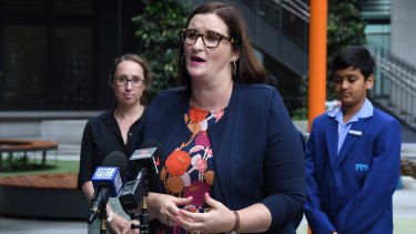 Education Minister Sarah Mitchell is looking for student teachers and retirees to work as tutors. 