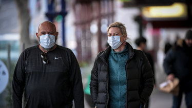 Mask-wearing on Lygon Street in Carlton.