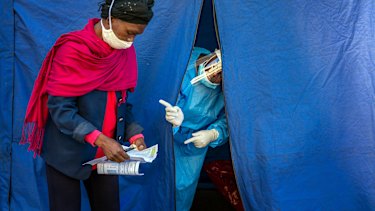 Taking advantage of testing: South Africa tests people for HIV and tuberculosis in Johannesburg at the same time as COVID-19, as it begins a phased easing of coronavirus restrictions.