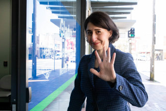 Former NSW premier Gladys Berejiklian waves hello outside her Northbridge office in Sydney on Wednesday.
