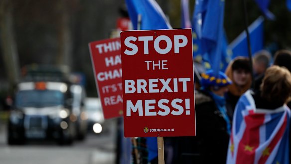 Pro-European demonstrators protest outside parliament in London on  Friday.