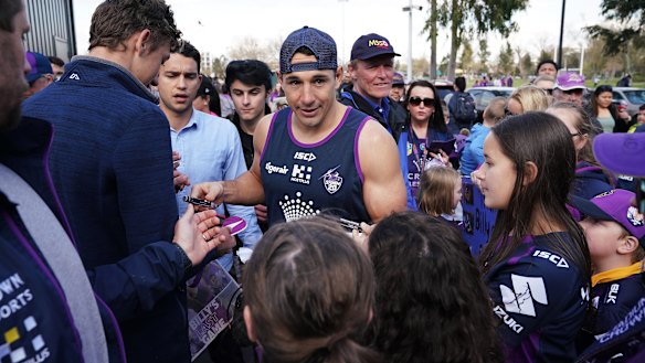 Nervous wait: Slater signs autographs at the Storm's fan day on Monday.