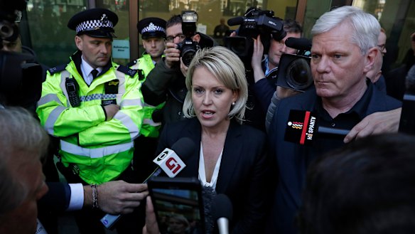 Kristinn Hrafnsson, editor of WikiLeaks (right), and barrister Jennifer Robinson (centre) speak outside court.