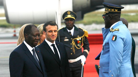 French President Emmanuel Macron is welcomed by Ivory Coast President Alassane Ouattara upon arrival in Abidjan at the weekend.